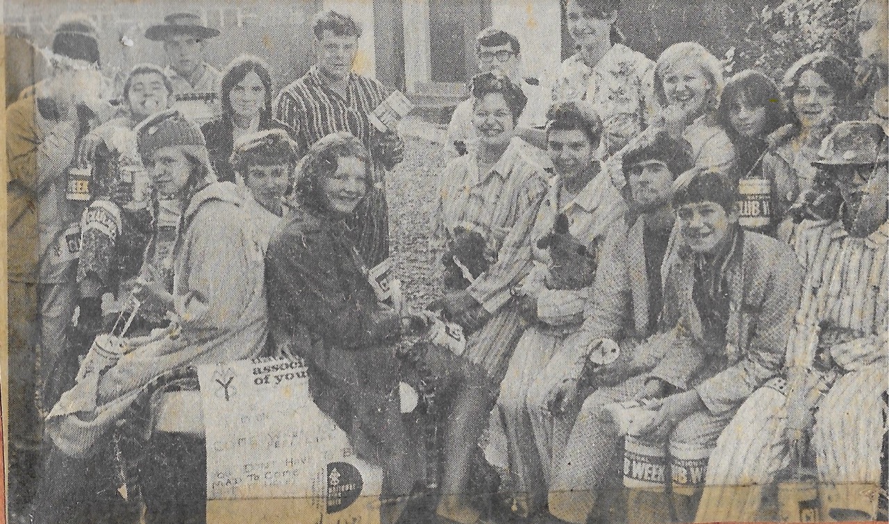 Black and white photo showing members of Shifnal (St Andrew’s) Youth Club raising funds for their club by dressing in pyjamas